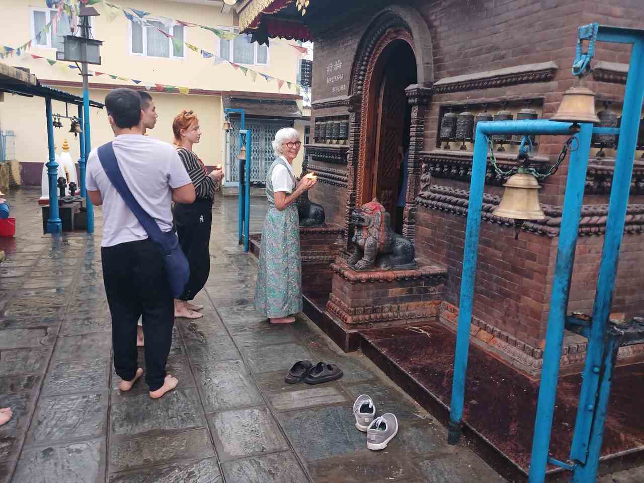 Participants lining up to make offering in the Vasudhara temple